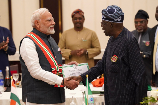 Photo of  Narendra Modi  and Bola Tinubu